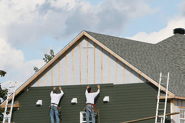 Professional Siding Installation technician working in Augusta, KY